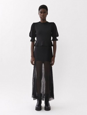 Prendas De Punto Chloe Flared Maxi Negros | CHE-SR13948